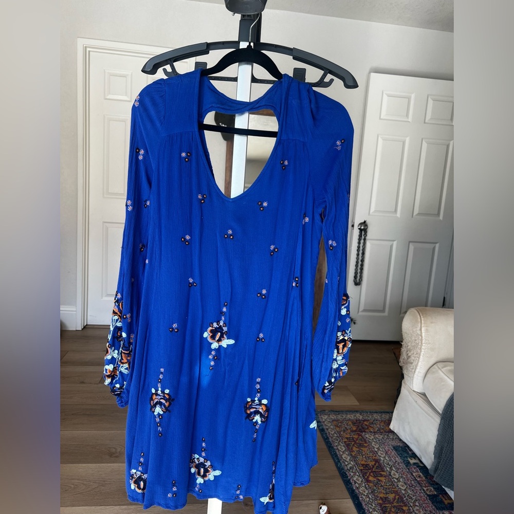 Free People Boho dress 
Bell sleeves and little leg. Perfect combo.